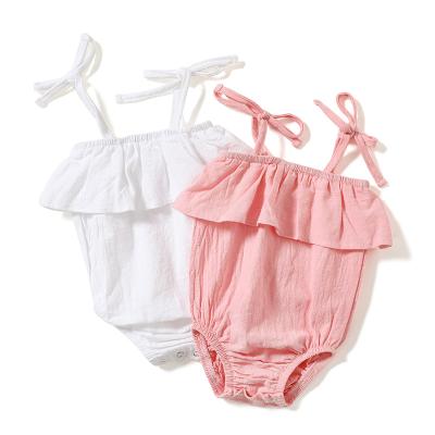 China Cozy baby clothes summer organic cotton muslin baby clothes romper sleeveless strap pants solid baby jumpsuit for sale