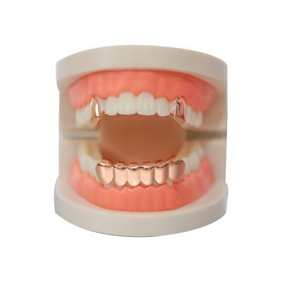 China Wholesale Hiphop Cheap Design Simple Hip Hop Jewelry Vampire Tooth Body Jewelry Grillz 18k Gold Teeth Grills for sale