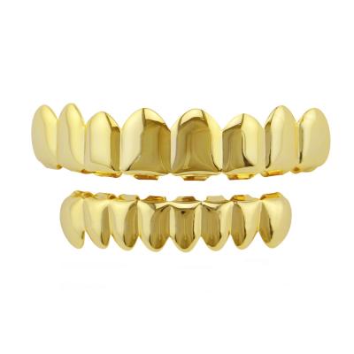 China Hiphop Top and Tooth Grillz Hiphop Gold Teeth Punk Grillz Halloween Cosplay Vampire Lower Teeth Dental Braces for sale