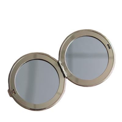 China Custom Factory Price Small Iron Folding Makeup Vanity Mirror Custom Makeup Mirrors for sale