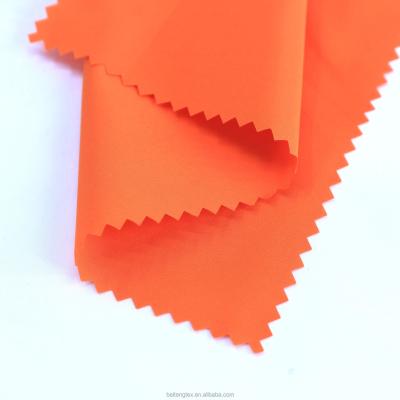 China 50D*50D 300T polyester waterproof memory pongee fabric rain coat orange jacket poncho pongee striping fabric for sale