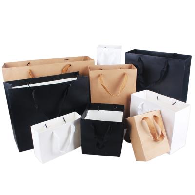 China Handmade Custom Logo Matte Laminated Kraft Paper Bag Grosgrain Ribbon Handle Bags Packaging for sale