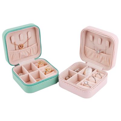 China PU Recyclable Multifunctional Portable Jewelry Box Small Travel Zipper Jewelry Box for sale