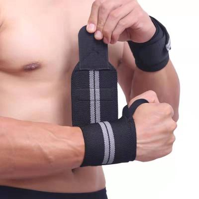 China Breathable Adjustable Elasticity Bodybuilding Weightlifting Wrist Grip Weightlifting Gym Wristband Wristband for sale