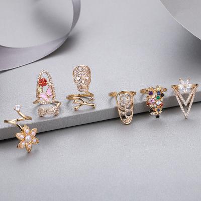 China Adjustable Nail Ring Women Beauty Finger Nail Flower Ring Hip Hop Zirconia Pearl Fingertip Plated New Real Copper Finger Nail Ring Gold for sale