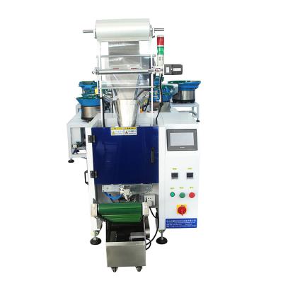 China xingke Automatic Stainless Steel Iron Nails Counting and Pouch Packaging Machine with Vibrating Feeder for sale