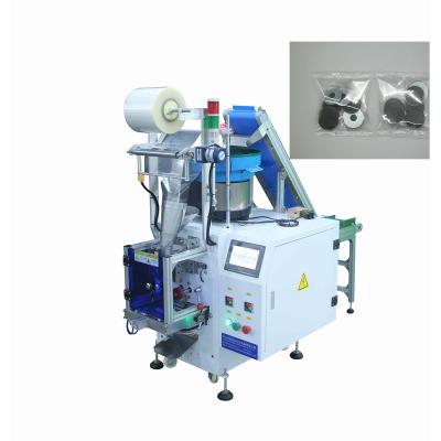 China Multifunctional Packaging Machine Metal Packaging Machine Screw Packing Machine for sale