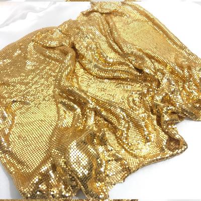 China Fashion Gold Metal Mesh Fabric Metallic Cloth Sequin Use For Apparel Table Runner Curtains Shoes Bags Home Decoration for sale