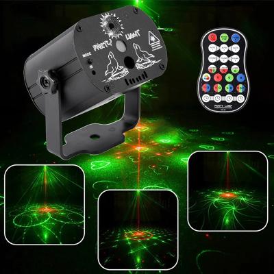 China USB Rechargeable Mini RGB Stage Disco Light Voice Control RGB Lamp DJ LED Laser Stage Projector For Wedding Birthday Party for sale