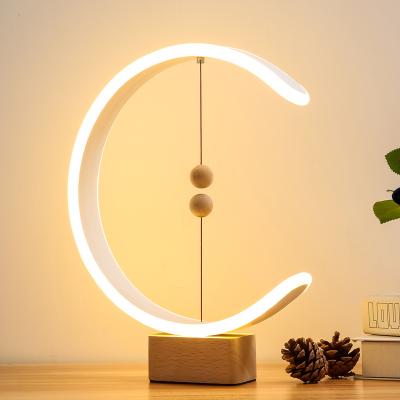 China Modern Creative Magnetic Hanging Lamp Creative Magnetic Balance Lamp Desk Bedside Table Decorative Light for sale