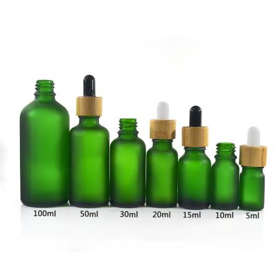 China Green Color Essential Oil Glass Bottles , 1 oz 2 oz 4 oz Boston Round Glass Bottles à venda