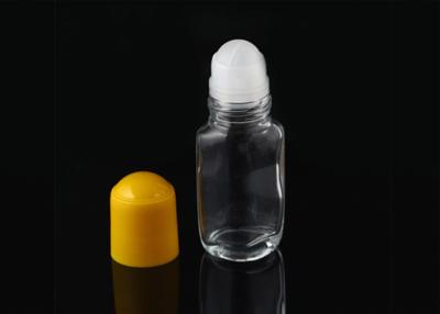 China Transparent Glass Essential Oil Roller Bottles 50ml With Yellow PP Plastic Cap à venda