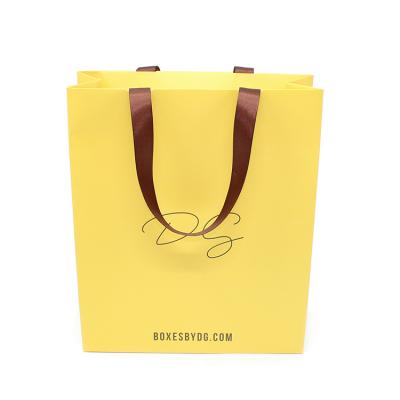 China Handmade Wholesale Gift Kraft Paper Shopping Tote Bag Stamping Custom Logo for sale