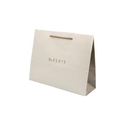 China Economical Recyclable Paper Bag Custom Design Carry Paper Bags With Logos Printing White Luxury Shopping Bag for sale