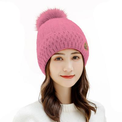 China breathable & Autumn Winter Fashion Knitted Women's Stylish Winter Hats Waterproof Winter Hat With Maple Leaf Logo for sale