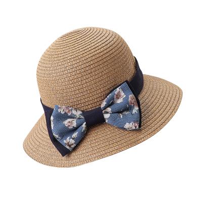 China New fashion small flower two color bowknot comfortable basin hats and comfortable sunshade wholesale straw hats for sale