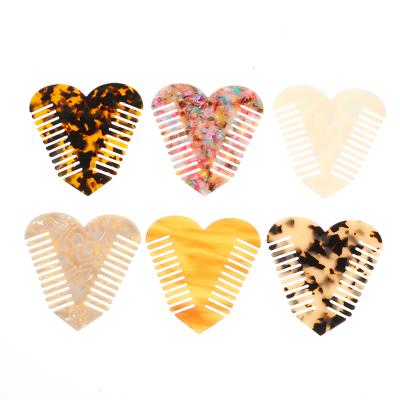 China Home Bilateral Acrylic Hair Comb Customization Leopard Copy Paint Home Large Size Tortoiseshell Bow Acrylic Heart-shaped Comb for sale