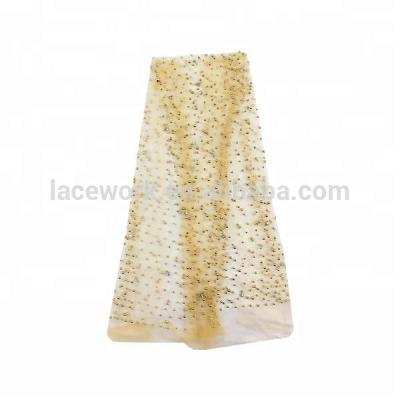 China Viable Wholesale Quality 3D Beaded Beads Bridal French Tulle Lace Dress Fabrics With Shinning Crystals for sale