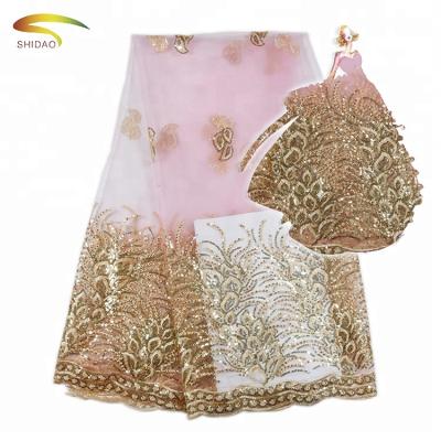 China Best Viable Quality African Pink Two Sides Embroidery Lace Fabric With Shinning Gold Sequins for sale