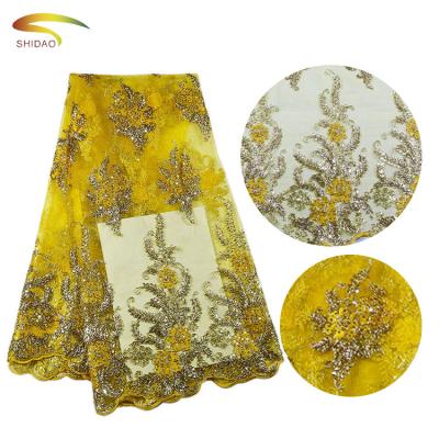 China Viable African Hot Lace Embroidery Lace Dress Yellow Floral Fabric for sale