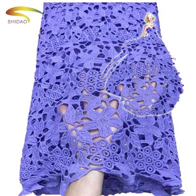 China Viable Wholesale Cavity Stretch Lace Fabric African Embroidery Roll Lace Fabric For Lace Dress for sale