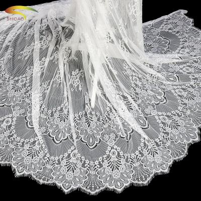 China 150cm DIY Nigeria Soft Viable Bridal Wedding Dress White Eyelash Stretch Lace Fabric for sale