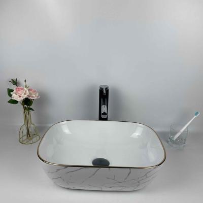 China Hot Sale Modern Luxury Lavabo Western Style Single Wash Top Table Bathroom Ceramic Sink New for sale