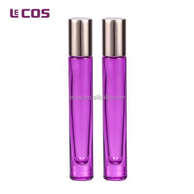 China Personal Care 8ml Clear Cylinder Glass Perfume Bottle With Gold Cap for sale