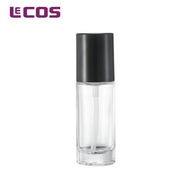 China Personal Care 30ml Cylinder Base Glass Bottle With Pump for sale