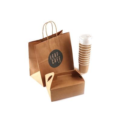 China Disposable Take Away Kraft Food Grade Paper Bag With Handle for sale