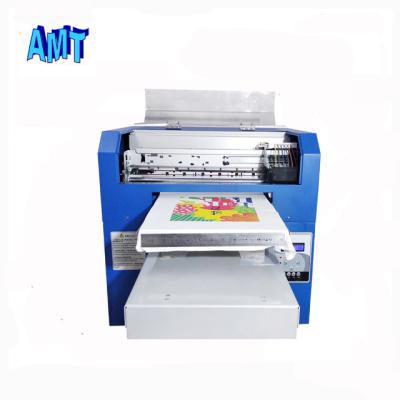 China Hotels Continuous Low Ink Supply T Shirt Printers Price for sale