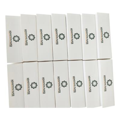 China Recycled Materials 2021 Top Selling Bleached Wood Fiber Unbleached Materials High Transparency Rolling Paper Booklet for sale