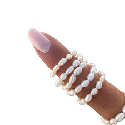 China 2021 summer FASHIONABLE hot sale natural freshwater pearl ring true all-matching simple string pearl elastic ring for sale