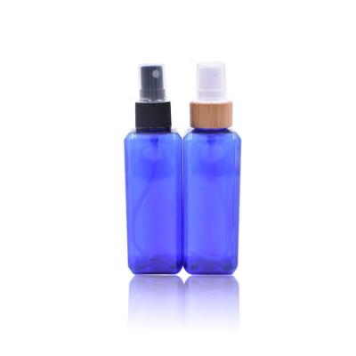 China Skin Care Water Purchasing Pet Spray Bottle Price, 100ml Refillable Empty Blue PET Square Bottle With Bamboo Plastic Sprayer for sale