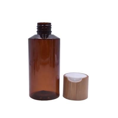 China 150ml/5oz Amber PET Bamboo Cosmetic Packaging Bottle High Quality Natural Bamboo Lotion Bottle Empty For Lotion for sale