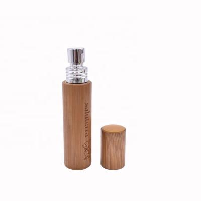 China Perfume Mini 10ml 12ml Biodegradable Cosmetic Refill Nature Size Travel Bamboo Wooden Glass Perfume Bottle for sale