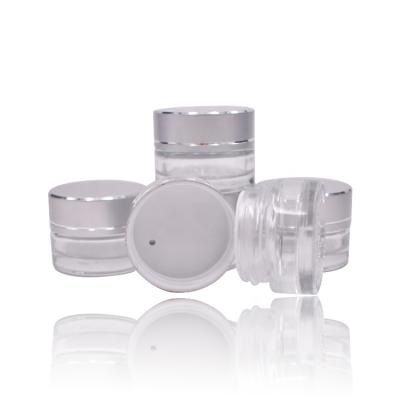 China Classic Recycled Mini 5ml Eye Clear Glass Cosmetic Jar Cream Airtight Jar With Matte Silver Aluminum Lid for sale