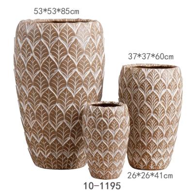 China Natural Stone Planter Cay Relief Surface Flower Pots Pastoral Garden Decoration for sale