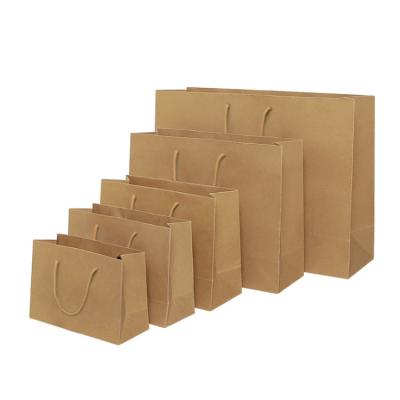 China High Quality Materials Custom Logo Recycled Kraft Paper Black And White Shopping Paper Bag for sale