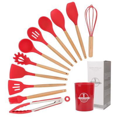 China 12 Piece Silicone Kitchenware Stocked Wooden Handle Cooking Spatula Set With Storage Bucket Nonstick Utensils for sale