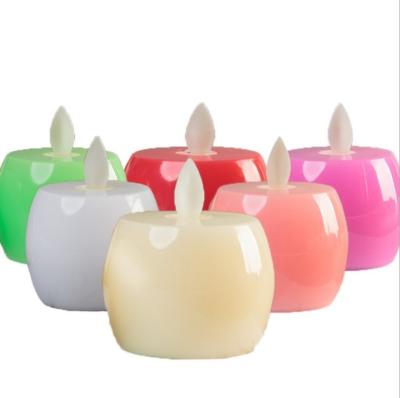 China Battery Operated Oval Moving Flame LED Candle Apple Shaped LED Candle With Moving Flame Creative Christmas Decoration Light en venta