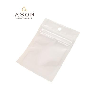 China Wholesale Pet Yin Yang Bone Bag Ziplock Bag Plastic Packaging White Translucent Bag for sale