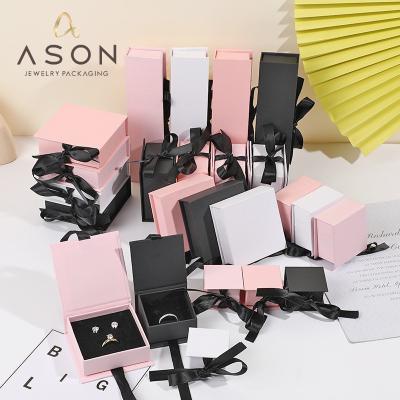 China Jewelry Packaging Box Factory Direct Selling Multi-specification Ribbon Flip Jewelry Storage Box Earring Top Jewelry Gift Box for sale