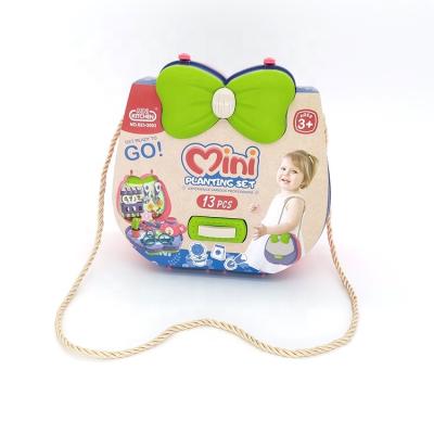 China Preschool Children Play New Mini Portable Multi Color Shoulder Bag Set Girls Party Makeup Table Dress Up Toy Set for sale