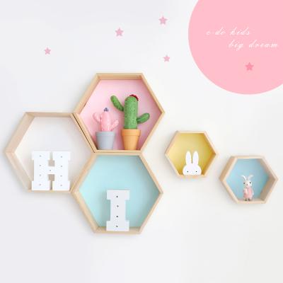 China Nordic Wooden Bedroom Decoration Children Wall Hexagon Shelf for sale