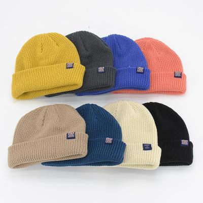 China COMMON Custom Knit Cuffed Acrylic Slouchy Beanie, Private Woven Label Logo Beanies, Fisherman Skull Hats Winter Streetwear Hat for sale