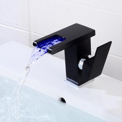 China Metered Faucets Single Brass Black Bathroom Hot And Cold Handle Wash LED Faucet for sale