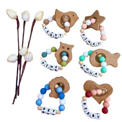 China Soft Toy Infant Baby Keepsake BPA Free Personalized Name Toy With Animated Pendant Silicone Chewable Bracelet Beads Teether for sale