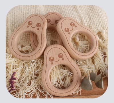 China New Arrival DIY 100% Natural Eco-friendly Laser Engraving Logo Beech Organic Wooden Teething Toy Avocado Natural Cute Baby Teether Wood for sale