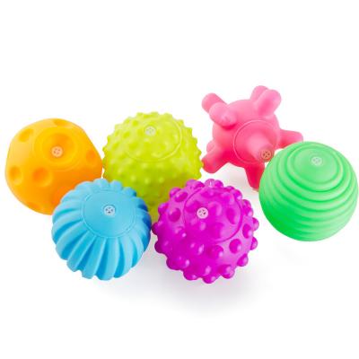 China Multiple Textured Safety Bath Toys Hand Balls Baby Accessories Catching Silicone Toy Teether Ball for sale